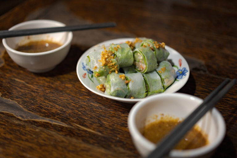 Fresh Cambodian spring rolls served with dipping sauce on our Siem Reap street food tour